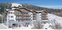Luxus apartment in Saalbach. Ski in - Ski out. 51.5 sq/m, living-kitchen, bedroom and a balcony.